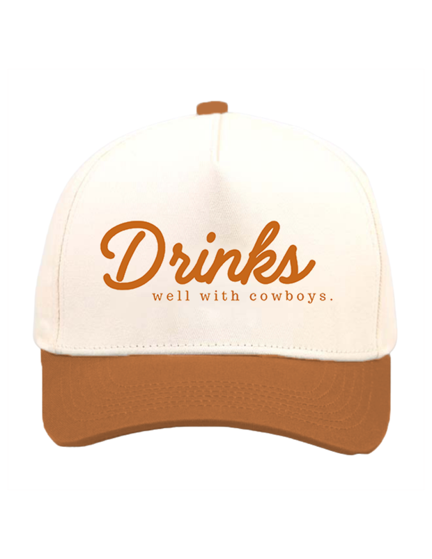 DRINKS WELL WITH COWBOYS